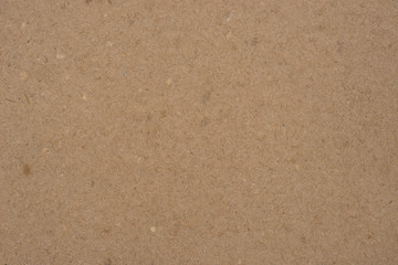Fototapeta na wymiar brown recycled paper background texture