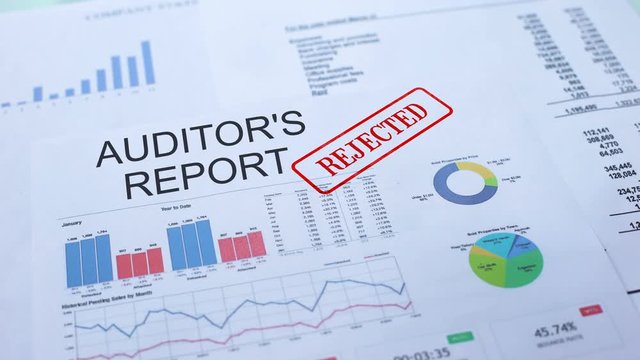 Auditors report rejected, hand stamping seal on official document, statistics