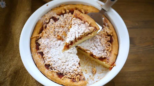sweet cake with jam in ceramic form