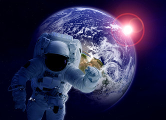 Astronaut in space. Elements of this image furnished by NASA