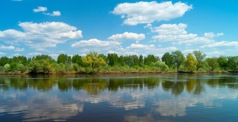 Obraz na płótnie Canvas Year landscape with river in rural terrain