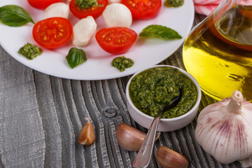 Caprese salad on a wooden rustic background