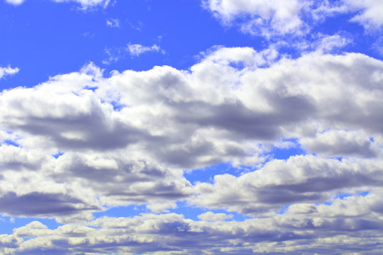 Beautiful blue sky and white stratocumulus clouds. Background. Landscape.