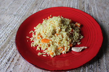 Plov. Vegan fresh tasty dish. rise with carrot, soya meat and garlic.