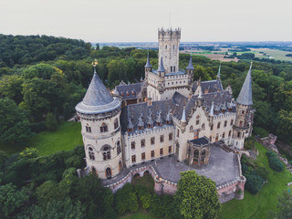 Fototapeta na wymiar View of Marienburg Castle, a Gothic revival castle in Lower Saxony, Germany, near Hanover, drone aerial view