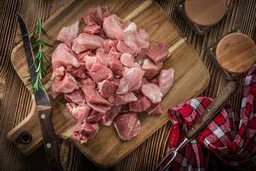 Raw meat diced for stew.