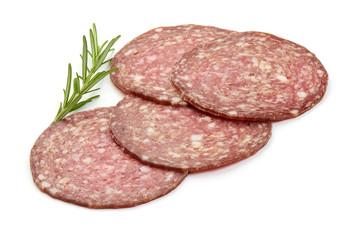 Sliced Milano Salami with herbs, isolated on a white background. Close-up