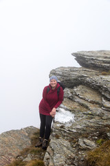 Woman hiker on the mountain 