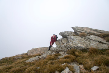 Woman hiker on the mountain 