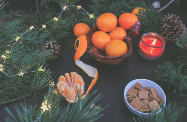 Mandarins in flat lay. Mandarins in still life composition for christmas.  Clementines and christmas decorations