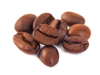 Roasted coffee beans isolated on white background. Three coffee beans