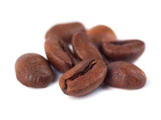Roasted coffee beans isolated on white background. Three coffee beans