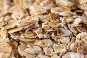 Rolled oats background. Organic oatmeal background texture