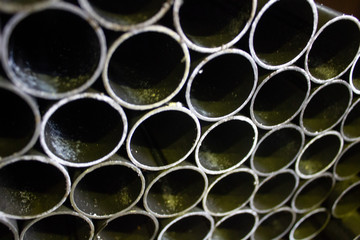 pipes build rows in a pile on a metal-working production..