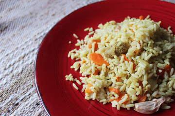 Plov. Vegan fresh tasty dish. rise with carrot, soya meat and garlic.