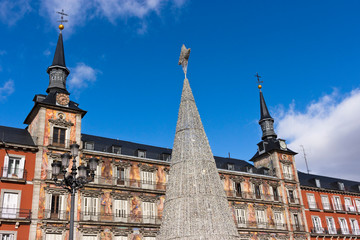 Madrid - Plaza Mayor,Christmas tree in front of Casa de la Panadería with painting facade.
