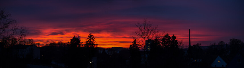 Fototapeta na wymiar dramatic sky from sunset over Pfaffenhofen