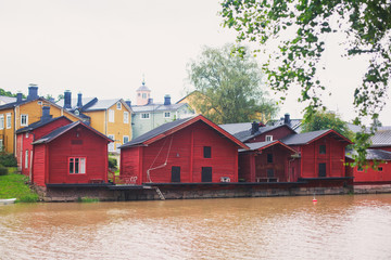 Obraz premium View of Porvoo old town with red wooden sheds, Borga, a city and a municipality situated on the southern coast of Finland approximately 50 kilometres (30 mile) east of Helsinki, Finland