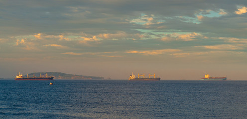 sunset on the sea and ships