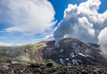 Steaming vent at mount Etna's summit crater Voragine, Sicily, Italy.