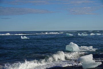 Beautiful beach near Jökulsárlón with blue sky and clouds on Iceland in summer