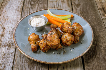 Chicken wings with blue cheese sauce