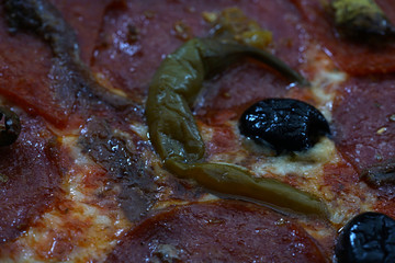 The today's, internationally widespread variant with tomato sauce and cheese as base probably originates from Naples.