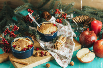 Fototapeta na wymiar Christmas and New Year composition with sweet delicious apples dessert