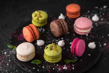 Colorful macarons cakes. Small French desert. Assorted Confectionery Range.