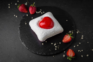 Be my valentine cake from biscuit, coconut and strawberry heart. Assorted Confectionery Range.