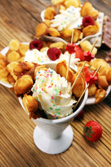 Hong Kong style egg waffle on wooden board. bubble waffle