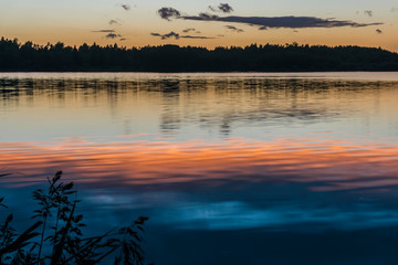 sunset view of the forest lake
