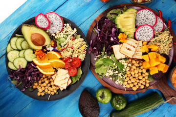 grilled tofu and dragon fruit buddha bowl with vegetable and humus