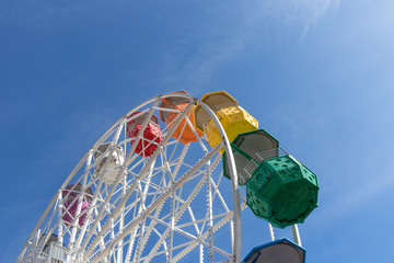 ferris wheel on blue sky