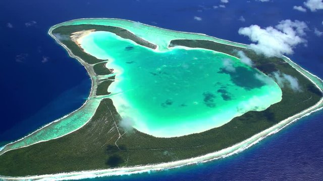 Aerial view of the coral atoll reef Tupai Heart Island South Pacific Ocean 