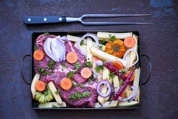 ngredients for goulash or stew cooking: raw meat,  herbs, spices,vegetables . Banner for website. 