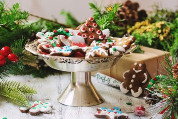 Decorated homemade Christmas Cookies on festive X-mas holiday background