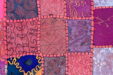 Detail old patchwork carpet. Close up