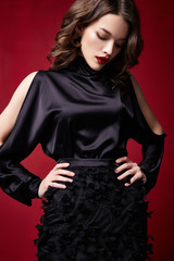 Portrait beautiful sexy pretty woman red lipstick jewelry earrings brunette hair cosmetic makeup fashion clothes beauty salon happy holidays merry Christmas Eve New Year St. Valentine's Day party. © indiraswork