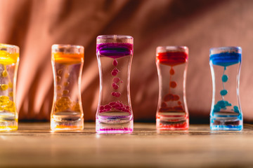 Toy with water and drops of oil colors.