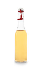 Glass bottle of apple vinegar on white background