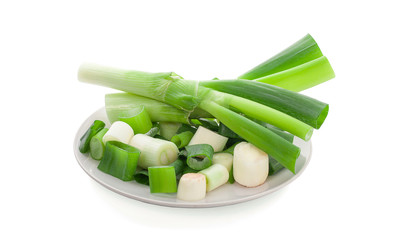 onions in plate on white background
