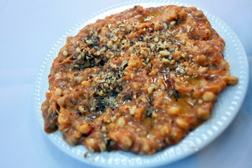 Traditional Antakya appetizer food 'Abugannus' on the dinner plate in Hatay (Antakya), Turkey.