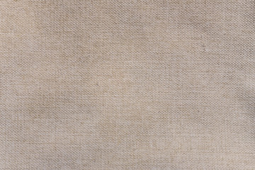 The texture of brown burlap. Rough fabric background.