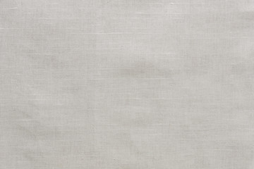Fototapeta na wymiar Texture of the white linen fabric. Blank fabric background.