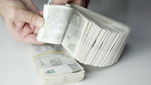 spreads the money like a fan Czech Koruna CZK Kc, in nominal  2000 Banknotes .zechia, Czech Republic