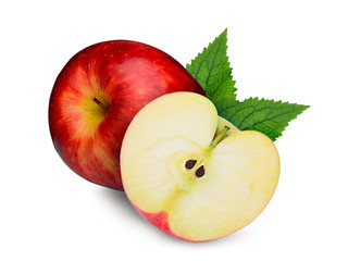 whole and half apple with green leaves isolated on white background