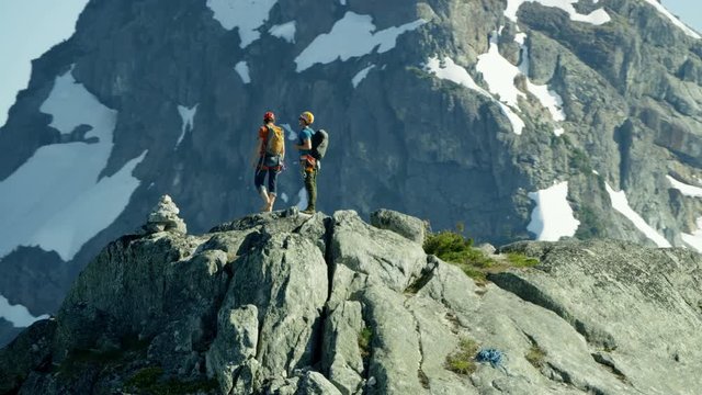 Aerial climbers celebrating on top Mount Habrich Canada