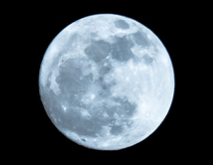 Full moon shines in the dark night.