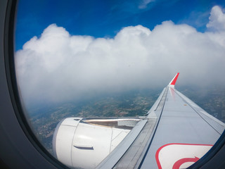Fototapeta na wymiar beautiful sky view through the aircraft window